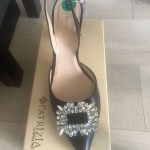 High heel ( 7 cm) Stylish Italian Black leather shoes with a sparkly brooch